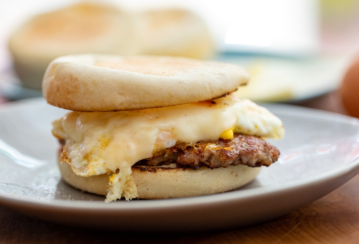 Smashed Sausage Breakfast Sandwich with Swiss Cheese