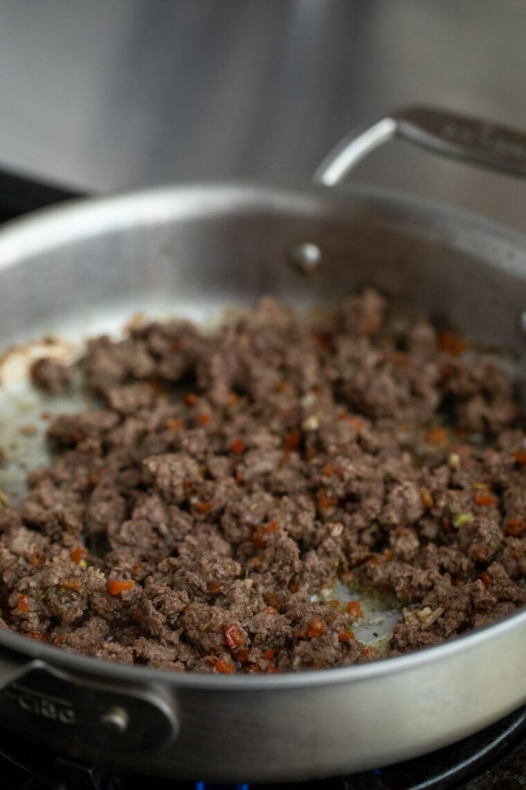 Browning beef in skillet.