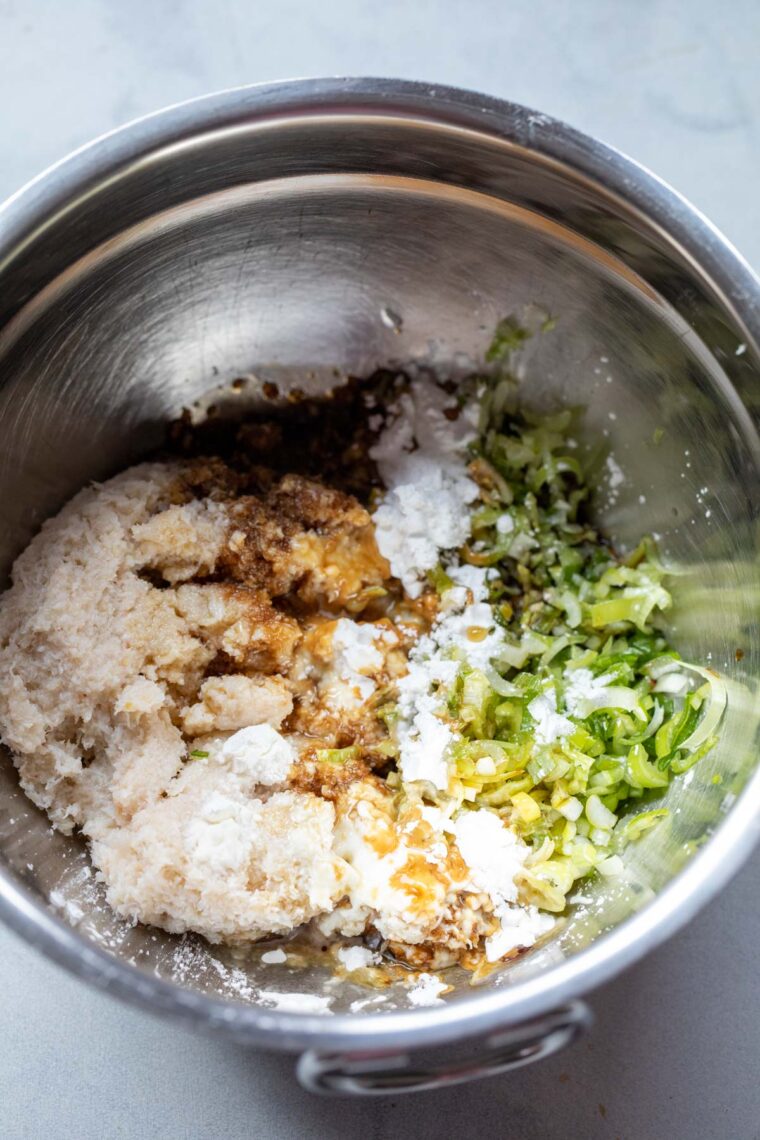 Mixing the filling for crab toasts.